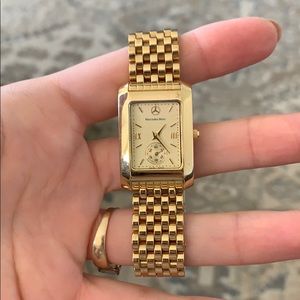 Women’s Mercedes-Benz gold watch